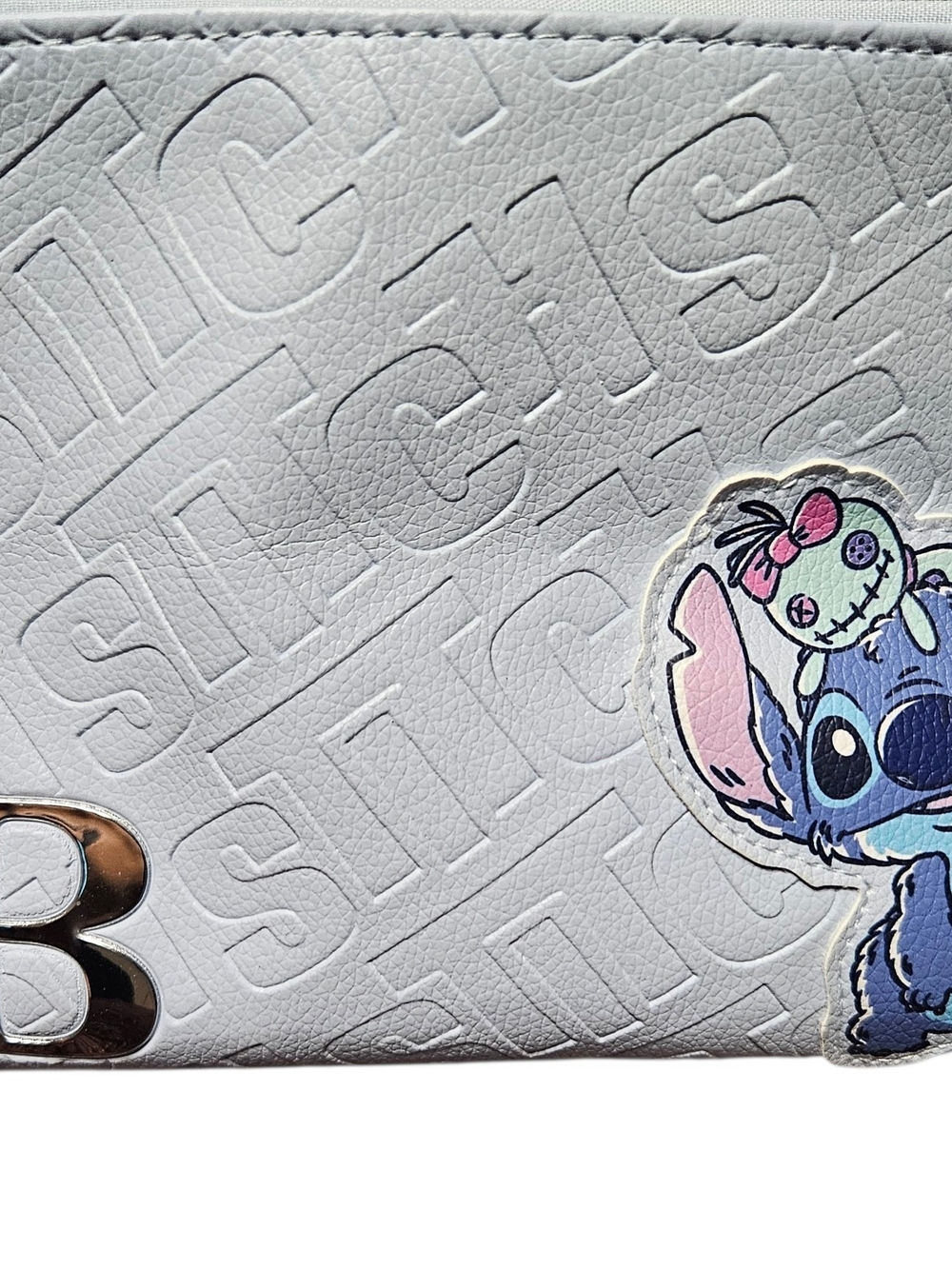 Disney White Embossed Stitch Cosmetic Bag with Colorful Patch